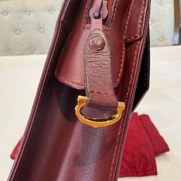 Authentic Cartier clutch bag with authenticity card